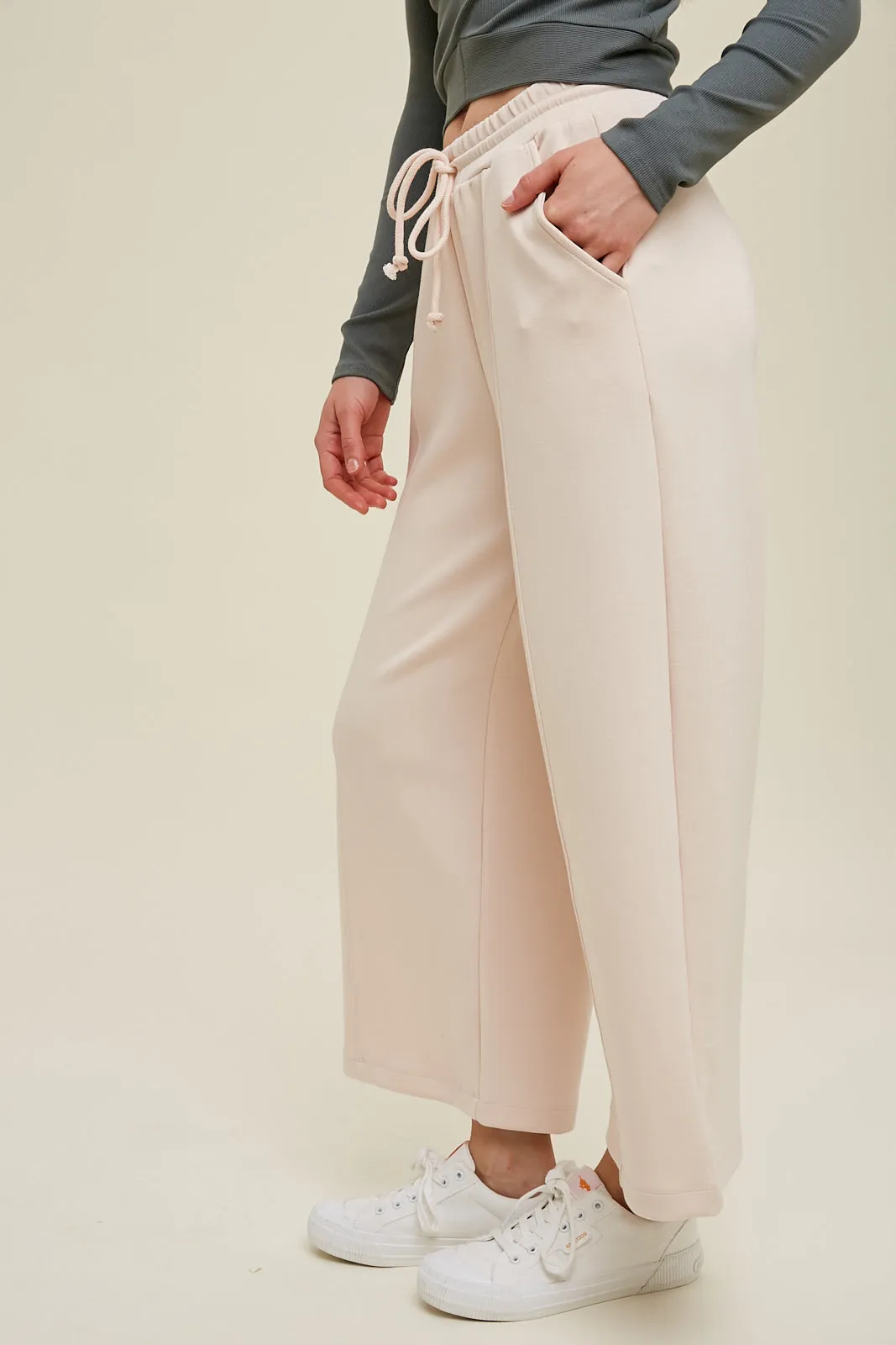 Scuba drawstring pants with side pockets and side slits