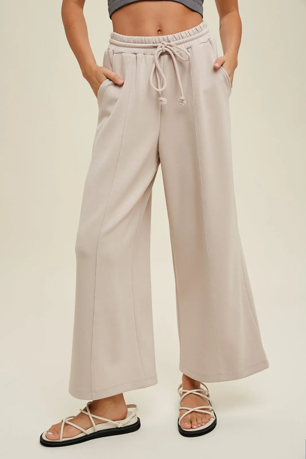 Scuba drawstring pants with side pockets and side slits